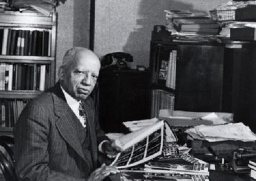Carter G. Woodson at his desk in 1948.