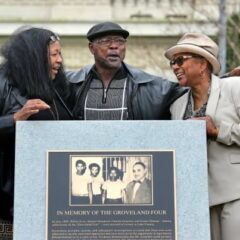 Relatives of the Groveland Four, including Carol Greenlee, right, gather at a monument that was unveiled in front of the Old Lake County Courthouse in Tavares, Fla., on Feb. 21, 2020.