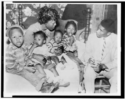 Medgar Evers is interviewing Beulah Melton about the murder of her husband, Clinton Melton in 1955. Mrs. Melton died (likely killed) before she could testify. Click photo to learn more. This is one of many murder cases Evers investigated. Photo: Library of Congress.