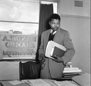 Anti-apartheid activist and lawyer Nelson Mandela in the office of Mandela and Tambo, a law practice set up in Johannesburg by Mandela and Oliver Tambo to provide free or affordable legal representation to blacks. (Photo by Jurgen Schadeberg/Getty Images)