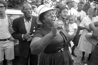 Fannie Lou Hamer singing during the 1966 "March Against Fear." Image: Jim Peppler, Alabama Dept. of Archives and History. 