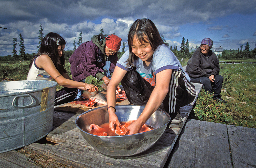 Yup'ik village children preparing salmon | Zinn Education Project