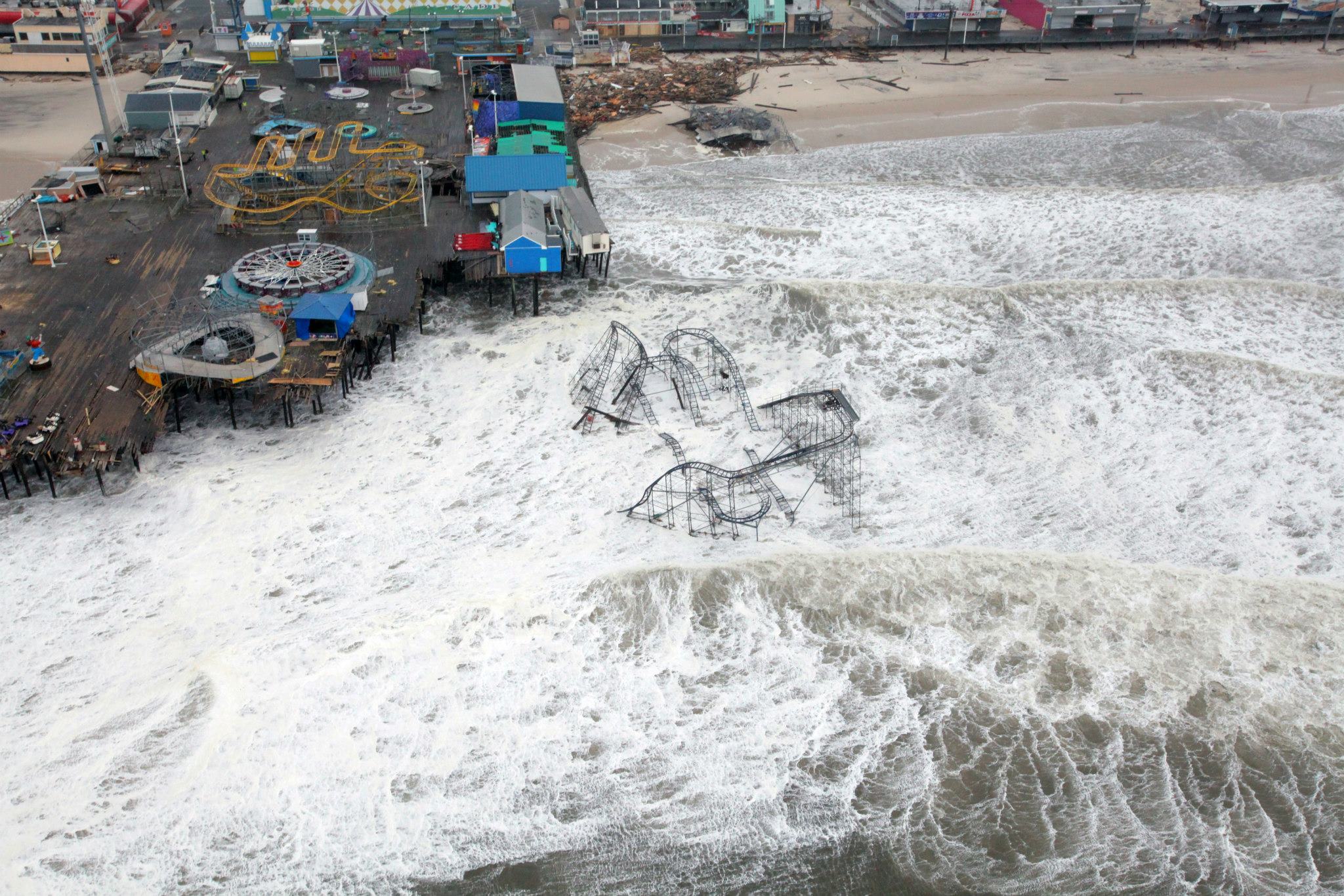 Hurricane Sandy damages a pier in Seaside Heights, New Jersey.
